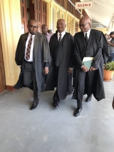 From left are attorneys Roysdale Forde, Neil Boston and Robin Hunte as they made their way to the Chief Justice’s court yesterday