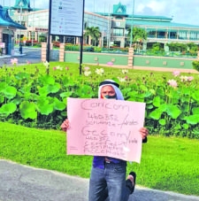 Trade unionist stages one-man protest in front of GECOM, diplomatic missions