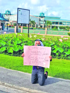 Trade unionist stages one-man protest in front of GECOM, diplomatic missions